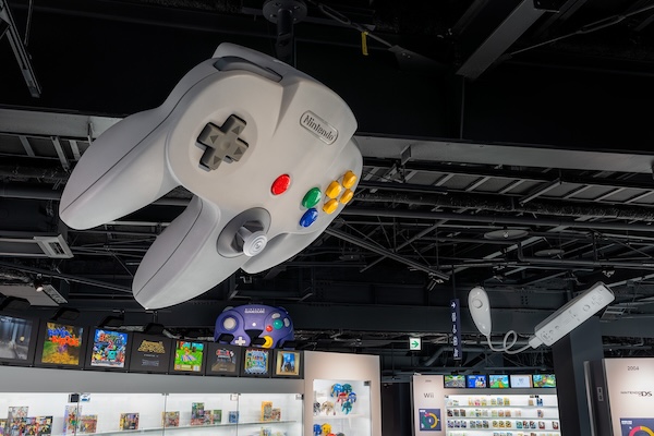 Exhibits inside Nintendo Museum with consoles and games